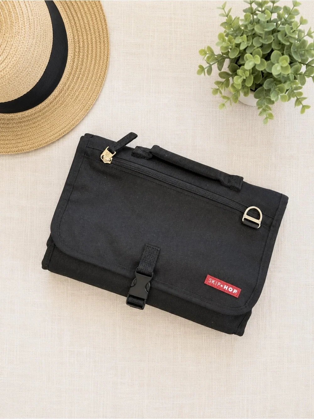 Black Skip Hop Canvas Diaper Bag and matching diaper changing pad clutch